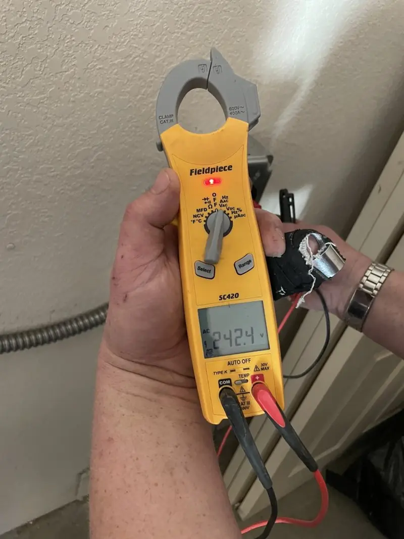 Voltage testing with clamp meter during Hot Tub / Pool Electrical Wiring in Galloway